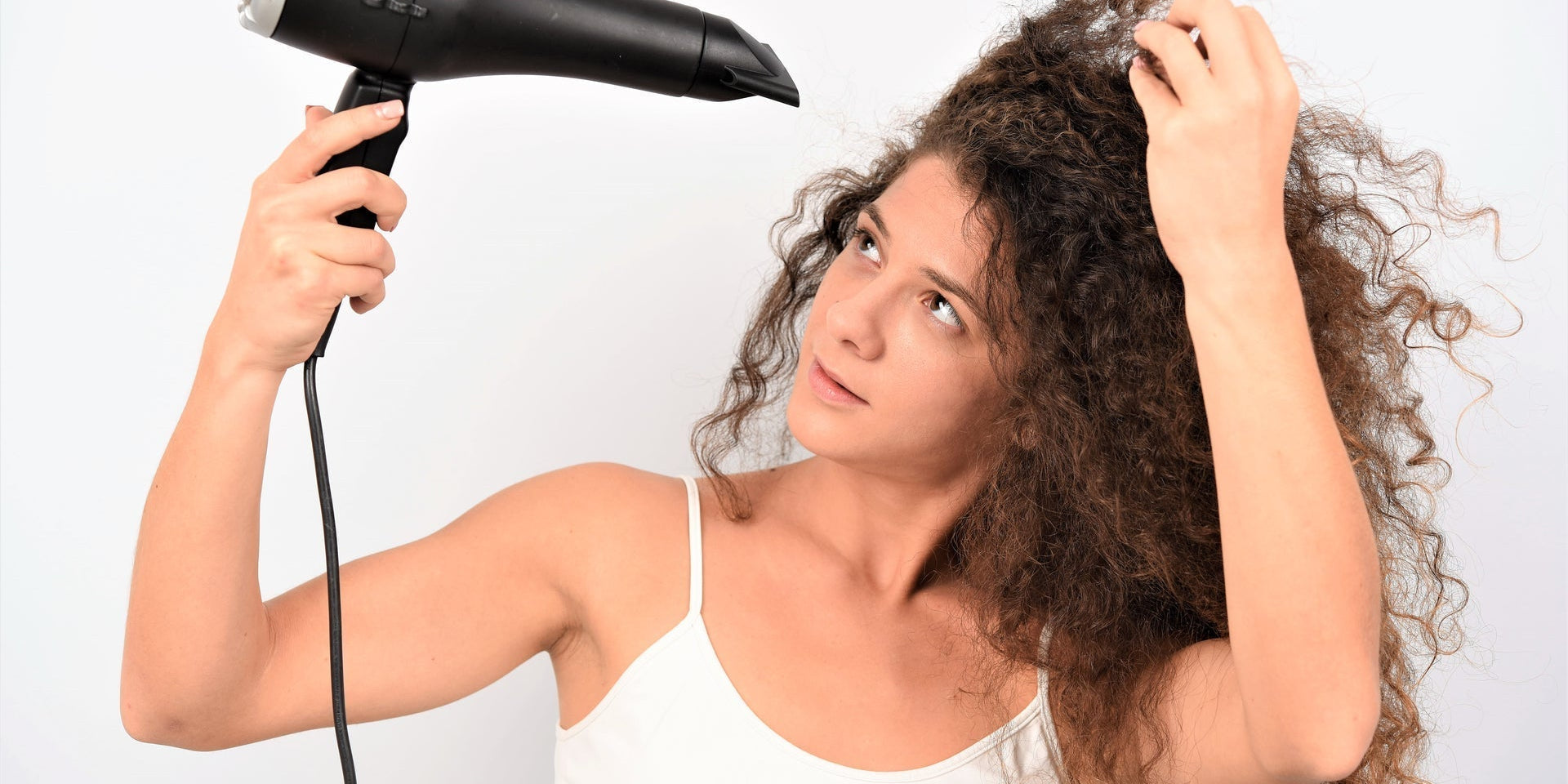 Why Does My Hair Take So Long to Dry? 4 Common Causes and Solutions