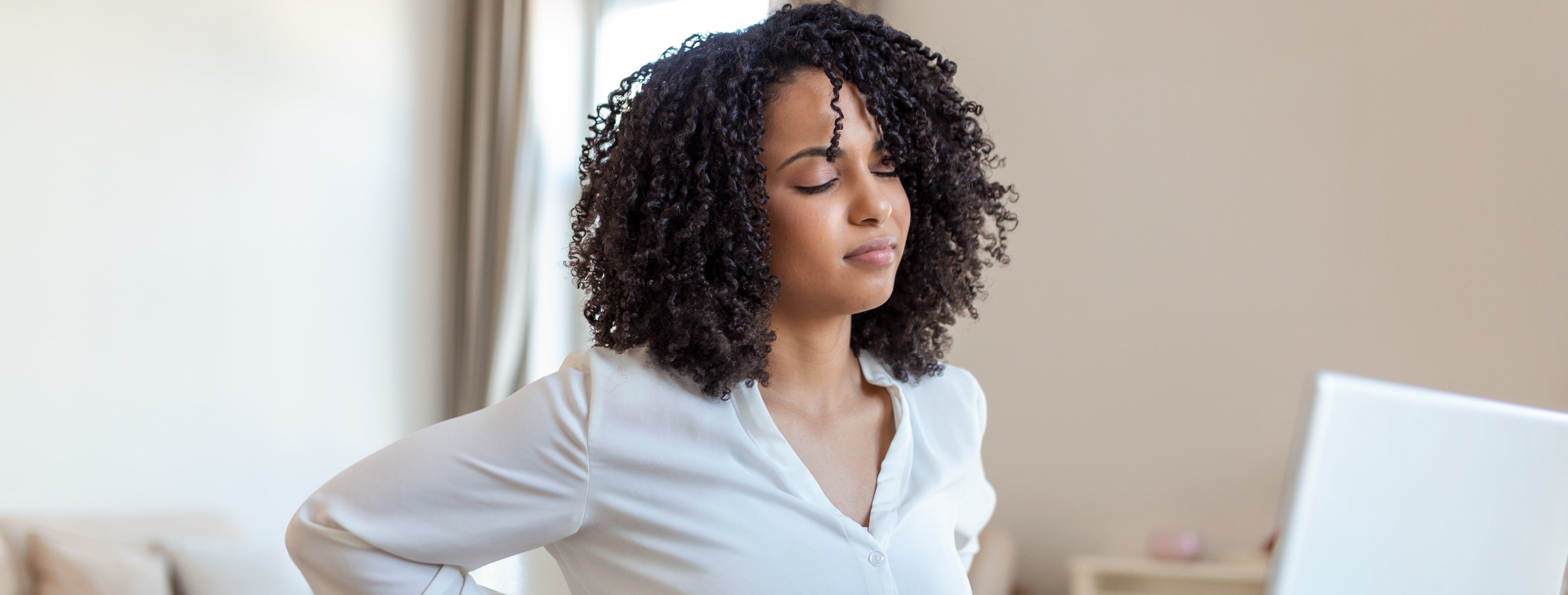 Vecteezy back pain bad posture woman sitting in office young afro 27783368 1