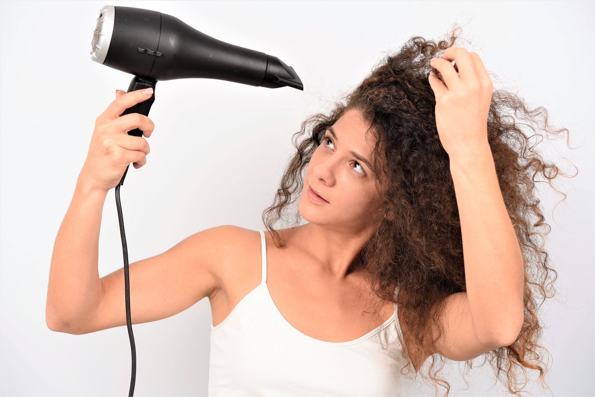 Why Does My Hair Take So Long to Dry? 4 Common Causes and Solutions