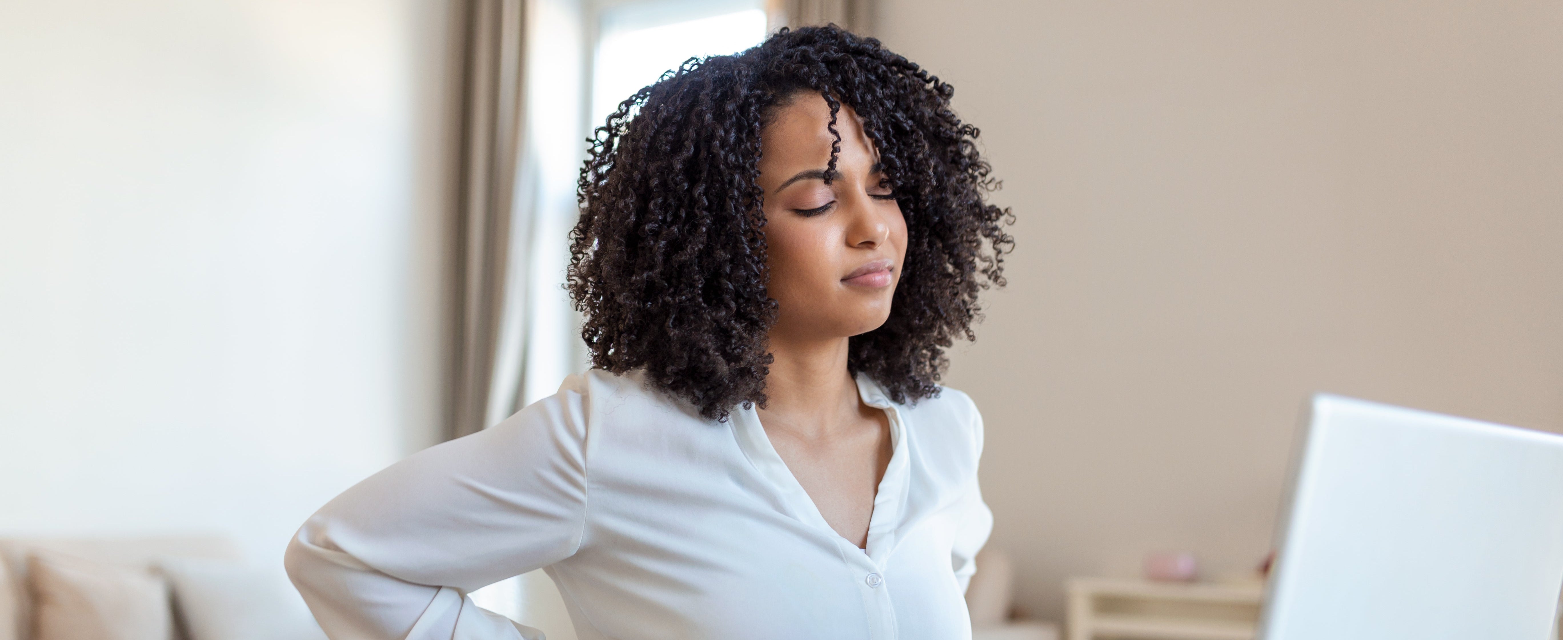 Vecteezy back pain bad posture woman sitting in office young afro 27783368 1
