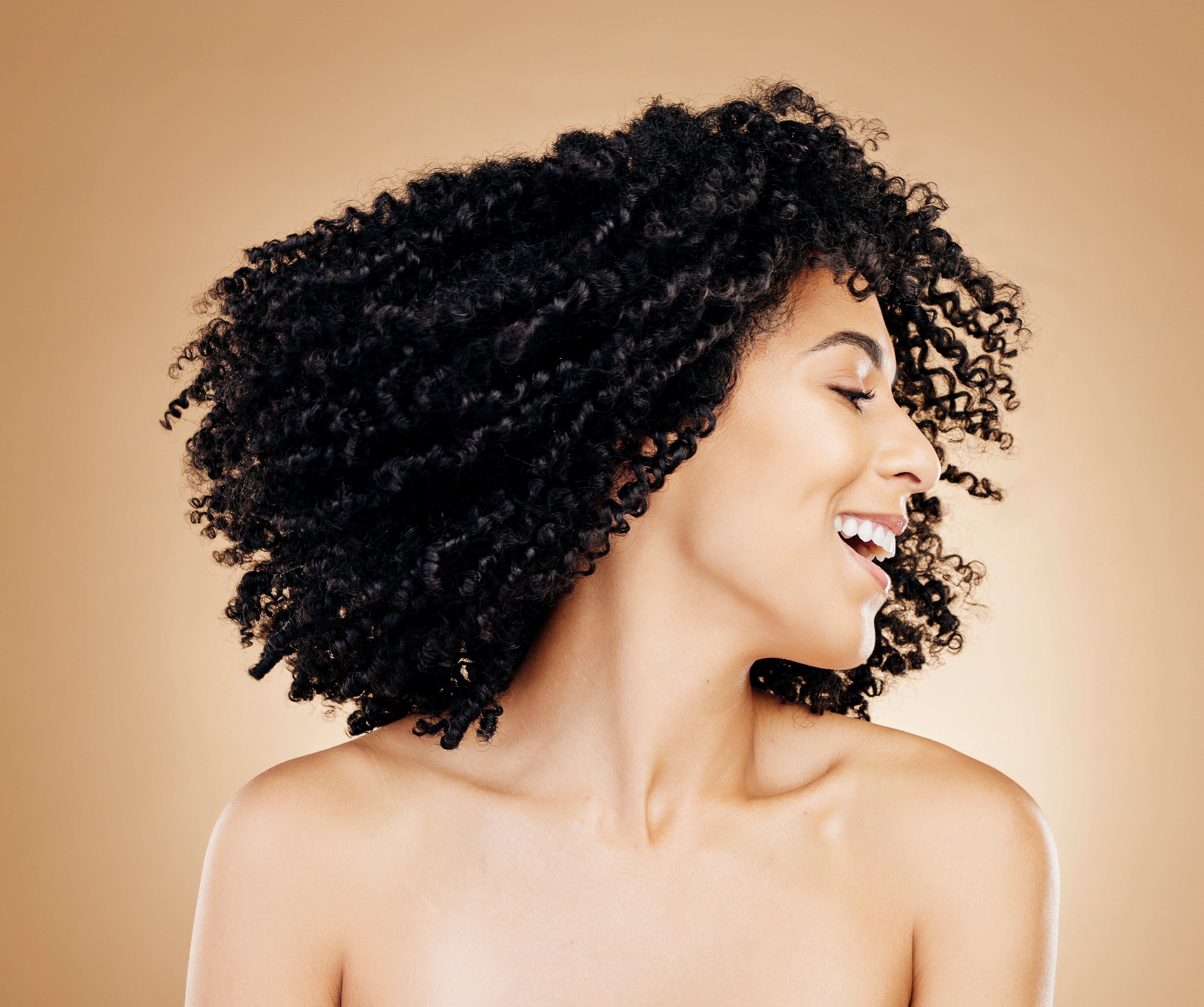 Vecteezy happy woman curly and hair shake afro for fun on studio 77948799